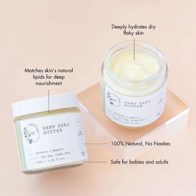 Two jars of hemp seed butter with labels on a beige background
