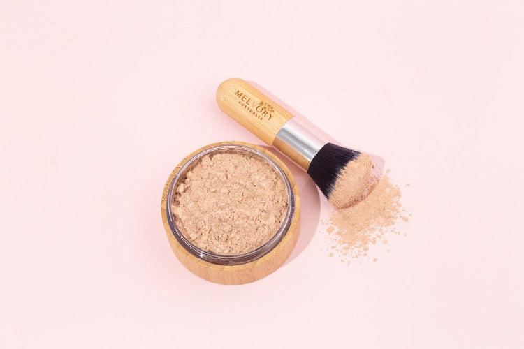 Melvory's natural mineral powder foundation with SPF 15. Light beige shade loose powder.