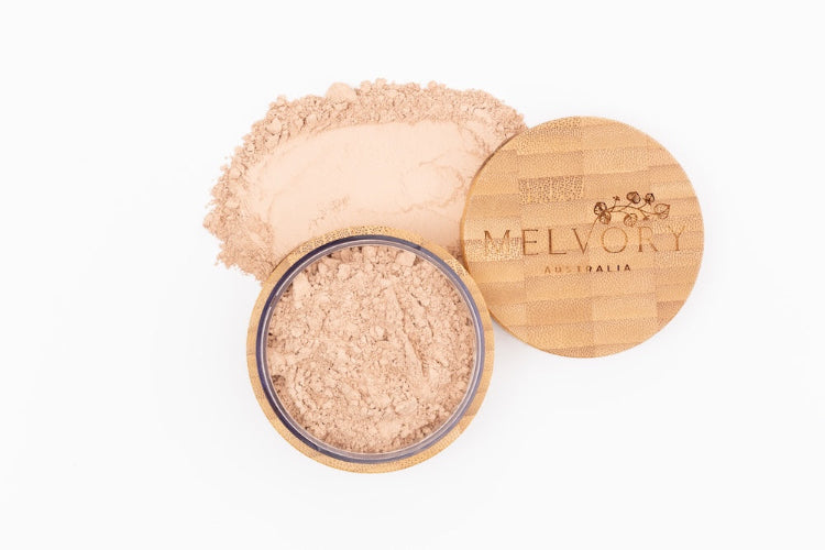 Melvory's natural mineral powder foundation with SPF 15. Light beige shade.