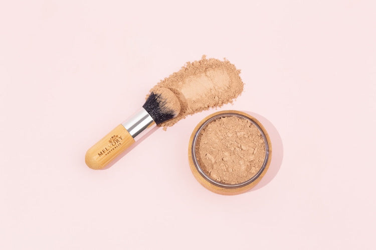 Melvory's natural mineral powder foundation with SPF 15. Warm honey shade.